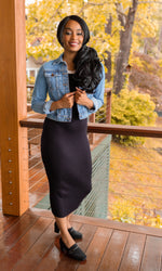 MUNRO CINDI II ON MODEL WEARING MID-LENGTH KNIT SKIRT ON DECK-LIFESTYLE