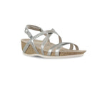 Tarifa silver metallic leather strappy sandal on low wedge platform with crisscross vamp and instep straps along with a hook & loop back strap-angle view