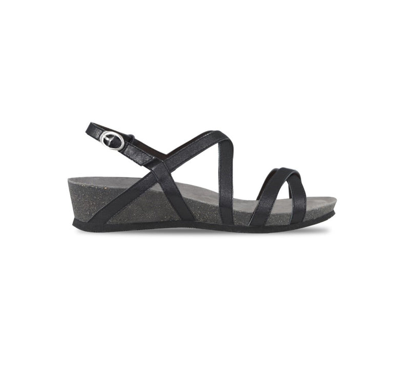 Tarifa black metallic suede strappy sandal on low wedge platform with crisscross vamp and instep straps along with a hook & loop back strap-side view