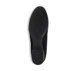 Joslynn kid suede in black flatt with a dainty bow and half-inch wedge for comfort - bottom view