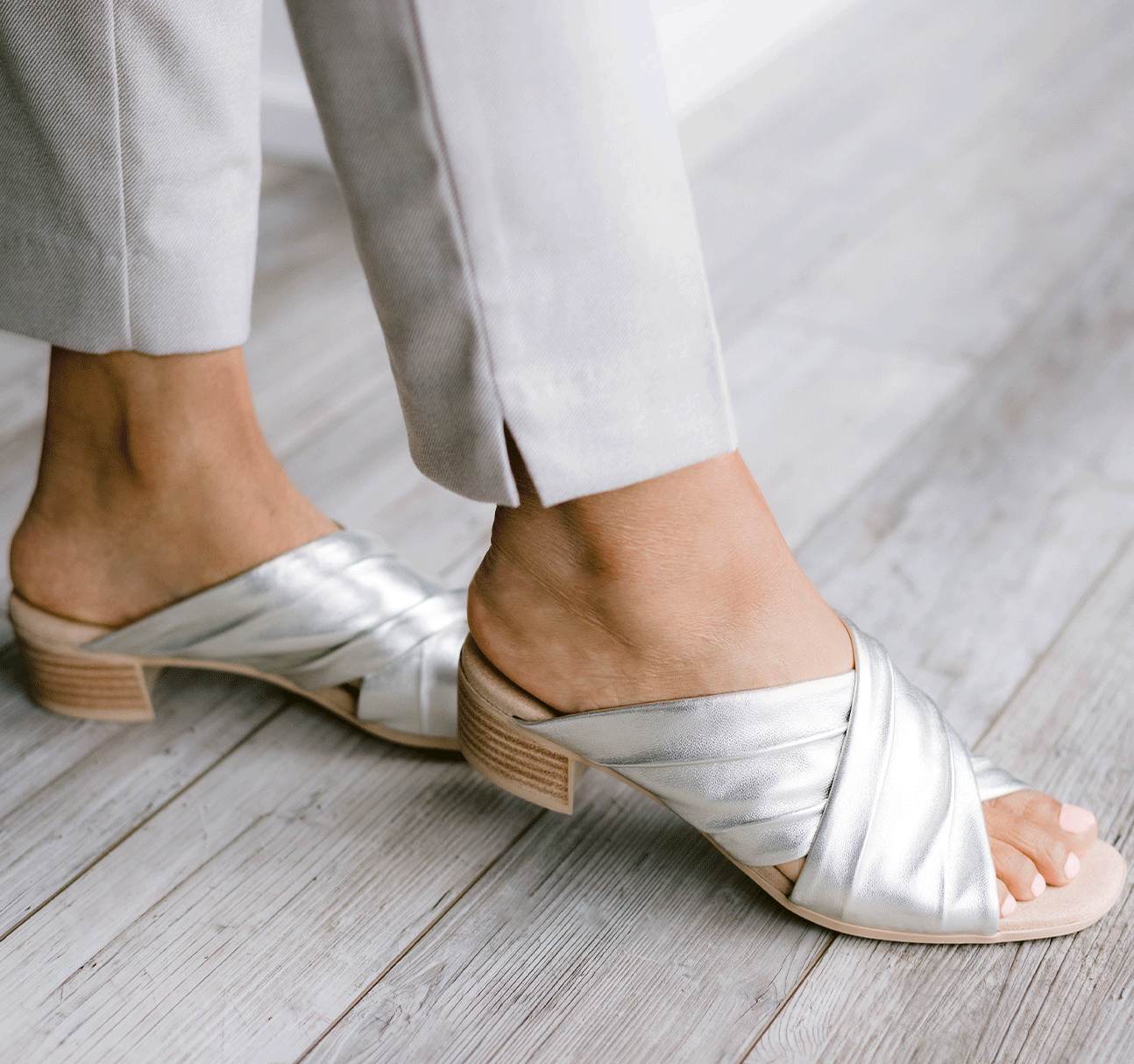 Lee ruched cross-band slide sandal on mid-height Leawood stacked heel in natural metallic ultra-supple lamb leather-lifestyle