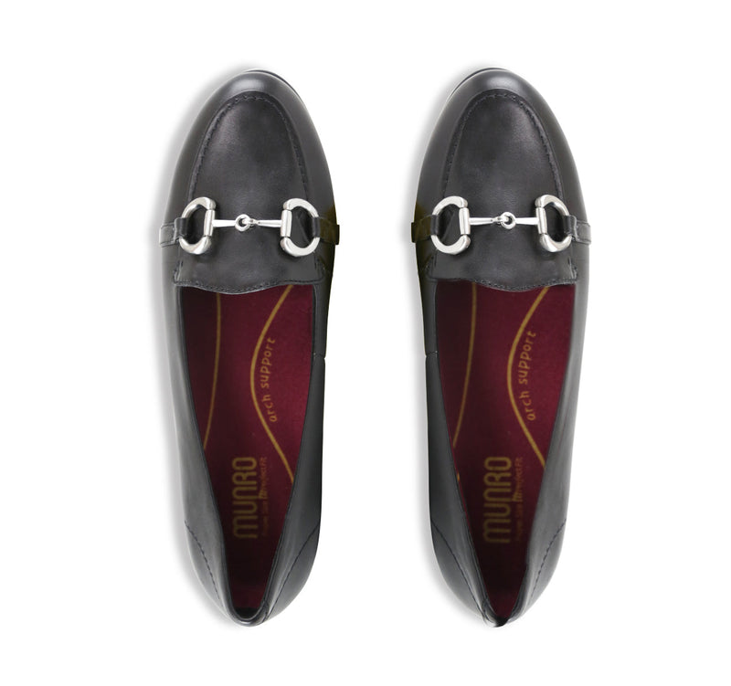 Tanya loafer in black lamb leather with saddle bit, apron vamp, and latex rubber outsole-top view