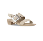 Ashlin mid-heel beige suede dress sandal with wide band vamp strap and hook & loop ankle strap and large decorative buckle-angle view