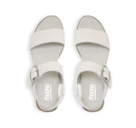 Cleo dress or casual sandal on low heel with buckle on ankle strap in off-white leather-top view