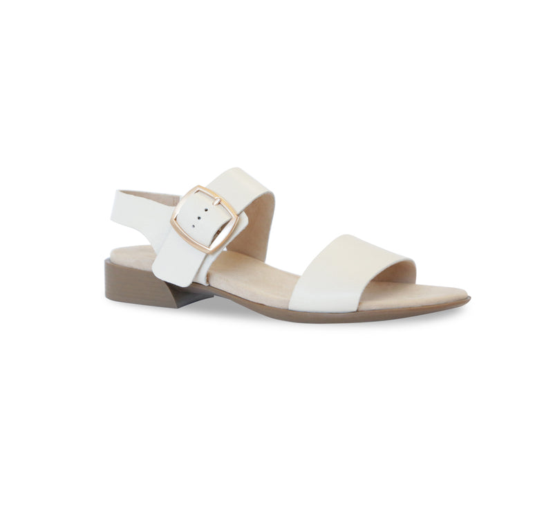 Cleo dress or casual sandal on low heel with buckle on ankle strap in cream color leather-angle view