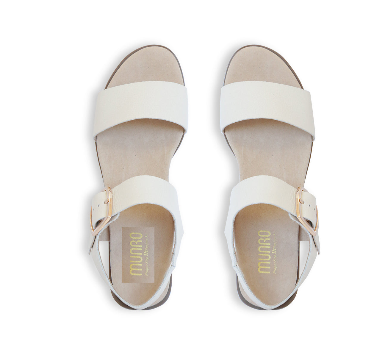 Cleo dress or casual sandal on low heel with buckle on ankle strap in cream color leather-top view