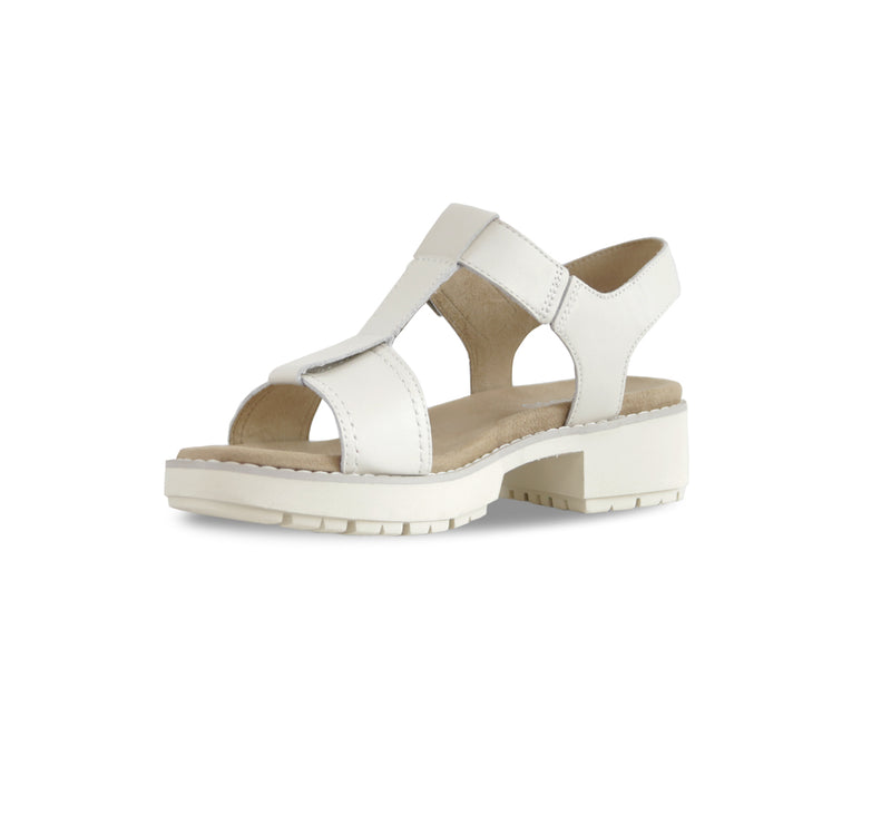 MEL IS A T-STRAP SANDAL, WITH A BUCKLE ON THE ANKLE STRAP AND LUG OUTSOLE LATTE LEATHER - INSIDE VIEW