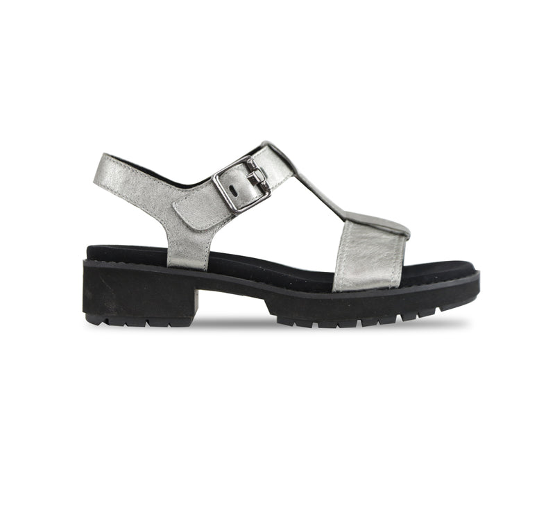 MEL IS A T-STRAP SANDAL, WITH A BUCKLE ON THE ANKLE STRAP AND LUG OUTSOLE ANTIQUE SILVER LEATHER - SIDE VIEW