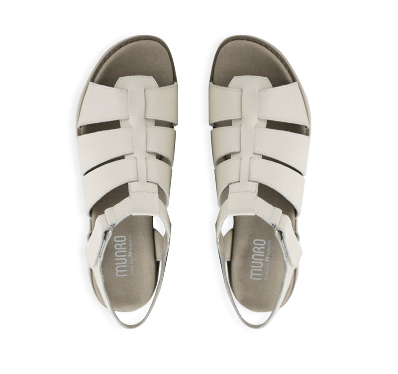 Marley three-strap and T-strap fisherman sandal with hook and loop ankle strap on lug outsole unit in latte leather-top view