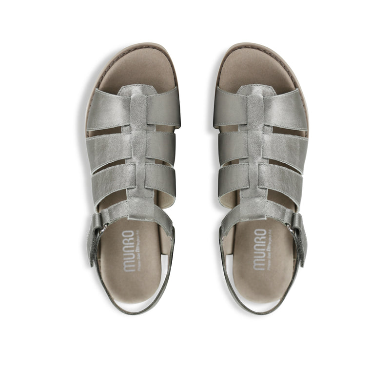 Marley three-strap and T-strap fisherman sandal with hook and loop ankle strap on lug outsole unit in silver metallic leather-top view