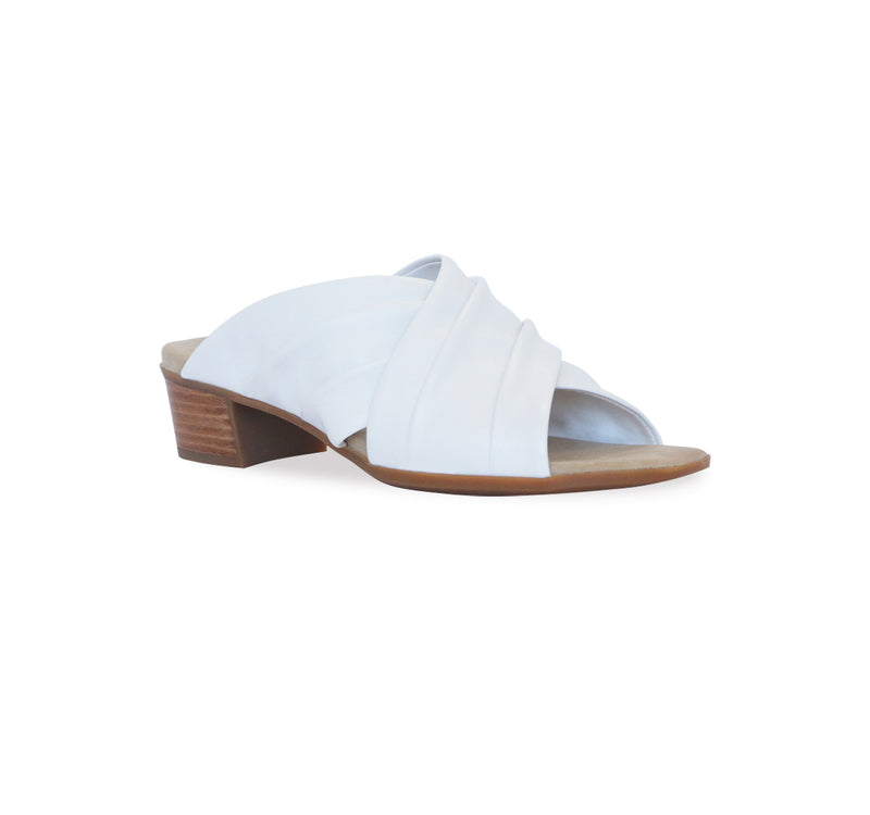 Lee ruched cross-band slide sandal on mid-height Leawood stacked heel in white ultra-supple lamb leather-angle view