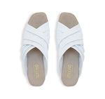 Lee ruched cross-band slide sandal on mid-height Leawood stacked heel in white ultra-supple lamb leather-top view