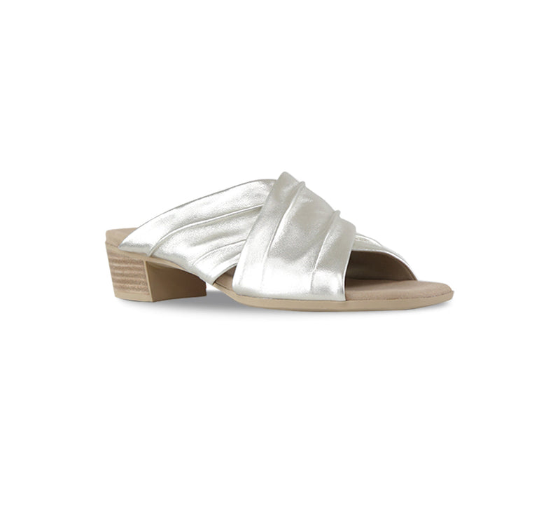 Lee ruched cross-band slide sandal on mid-height Leawood stacked heel in natural metallic ultra-supple lamb leather-angle view