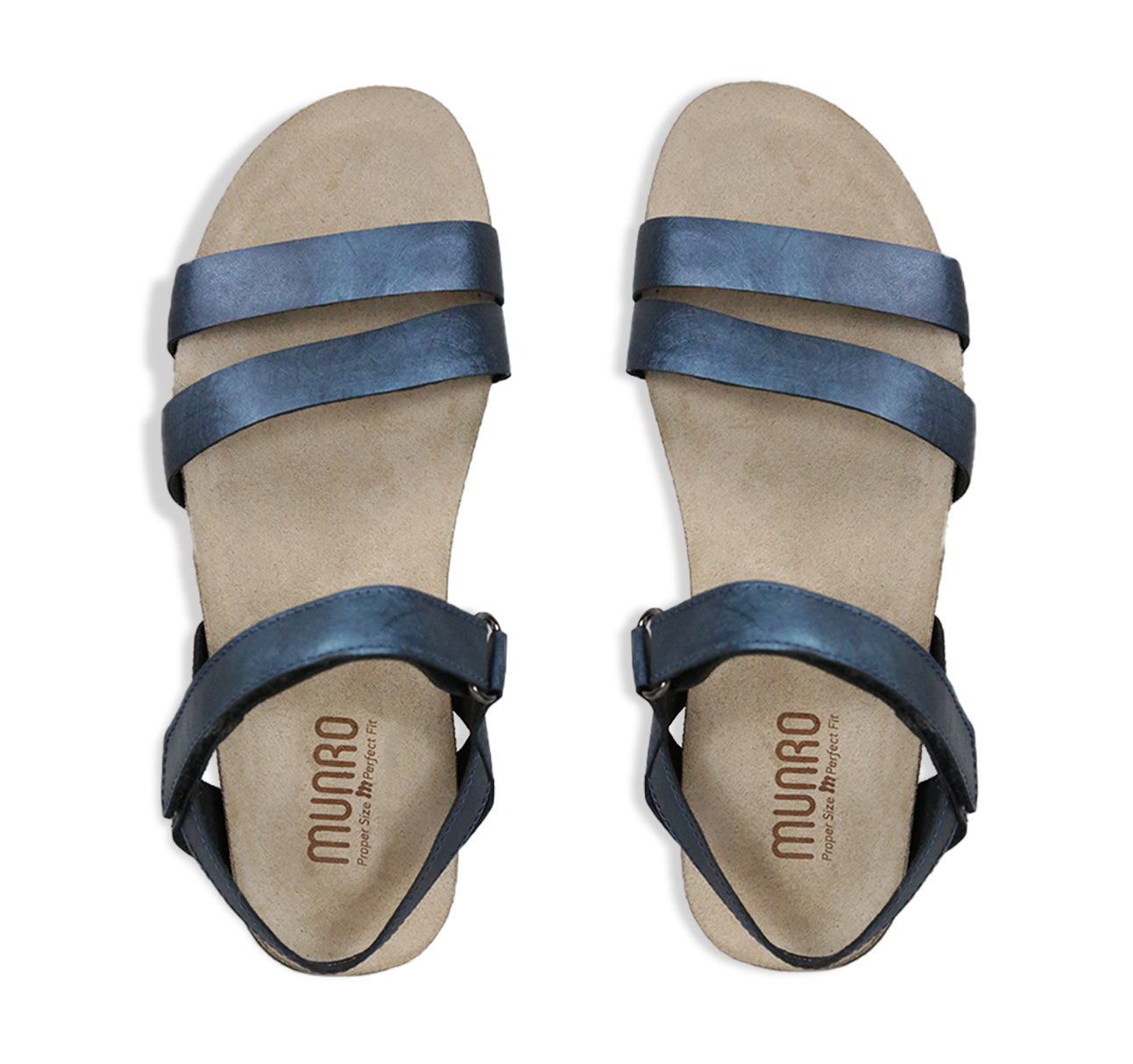 Juniper strappy suede covered cork footbed sandal on platform wedge in blue metallic leather-top view